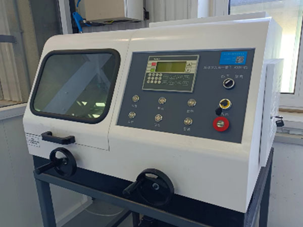 Sample cutting machine